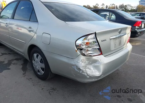 2003 Toyota Camry Le from USA, damaged, VIN 4T1BE32K93U690995